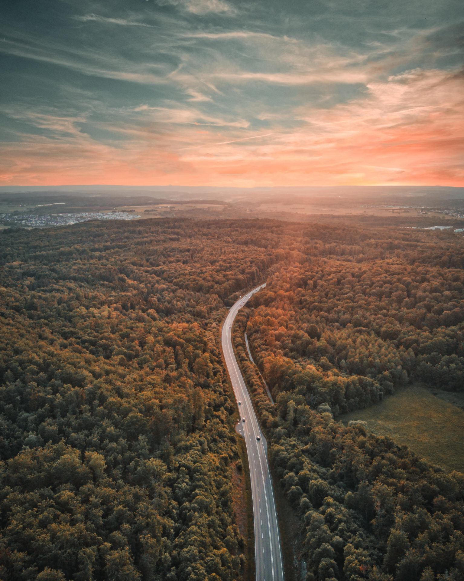 Aerial drone shot over an open road